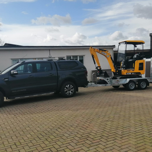low cost micro Digger and driver Hire Colchester
